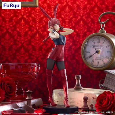 A figurine of a character with bunny ears, dressed in red shorts and thigh-high boots, posed in a theatrical setting with a clock and chess pieces.