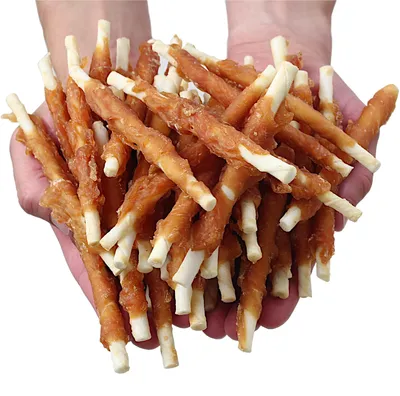 Imagen del producto de Palitos de cuero para perros, cubiertos con sabor a pollo, "Woof & Miau", 500 g