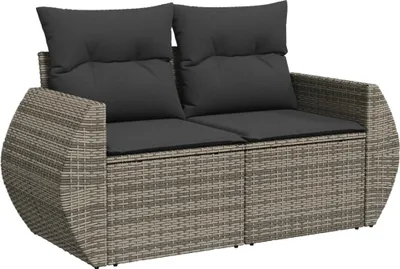 A studio shot of a two-seater outdoor sofa with cushions.