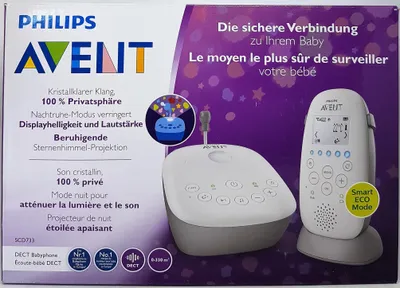 The image shows the packaging of a Philips AVENT baby monitor set, featuring the product components and descriptive text in multiple languages.