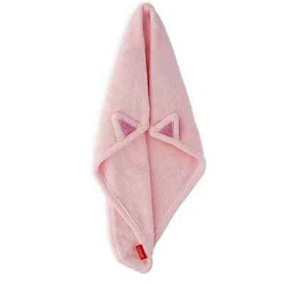 A pink towel with cat ears is folded and hanging.