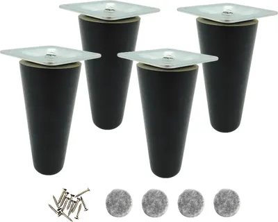 Four black furniture legs with silver mounting plates are shown against a white background. Below the legs are a pile of screws and four felt pads.