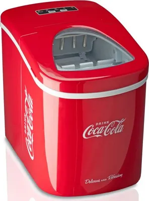 A red Coca-Cola themed ice maker on a white reflective surface.