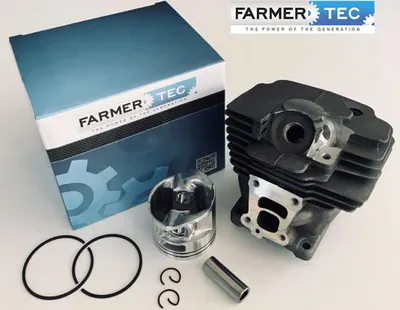 A product shot of a chainsaw cylinder kit, including the cylinder, piston, rings, and packaging.