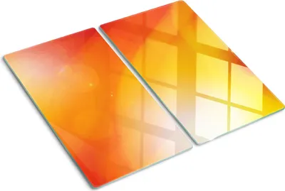 Obrázok produktu pre Sklenená ochranná doska – Kryt varnej dosky – Kryt na indukčnú dosku – 2x30x52 cm – Rýchle čistenie – Tvrdené sklo – Oranžové pozadie