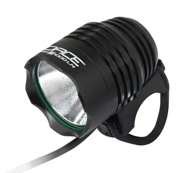 A black bicycle headlight with a mounting strap, shown against a white background.