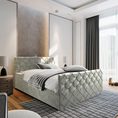 A bedroom with a bed, nightstand, and curtains.