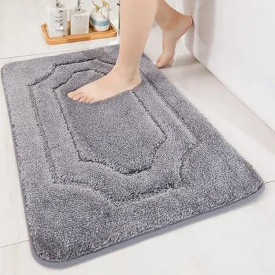 Produktbild von Unyqoos® Badematte 50 x 80 cm – weicher Polyester-Badvorleger, 2 cm Flor, hochsaugfähig & rutschfest (TPR), Grau