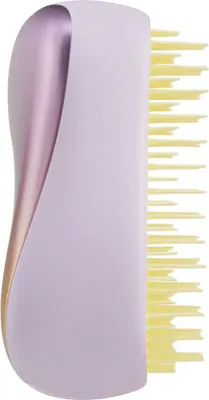 A side view of a Tangle Teezer hairbrush.
