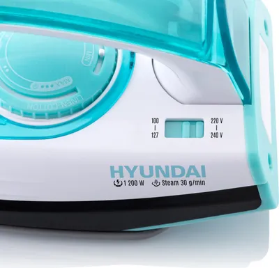 Close-up of a Hyundai steam iron, showing controls and branding.