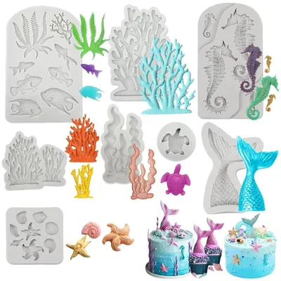 Immagine prodotto di 8 stampi in silicone a forma di creature marine 3D, ideali per decorare torte e dolci