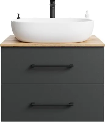 A bathroom vanity with a sink and faucet.