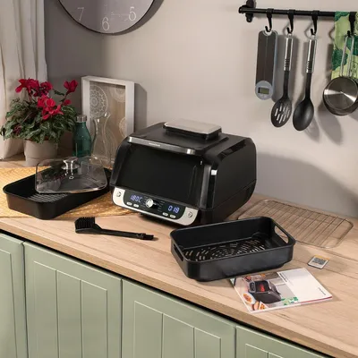 Produktbild von Heißluftfritteuse mit Grill, Zubehör und Rezeptbuch InnovaGoods Air Fryer Fryinn 12-in-1 6000 Schwarz Stahl 6 L 3400 W
