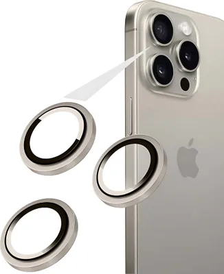 A close-up of a smartphone camera lens protector kit, with the protectors shown separately and then indicated to be applied to the phone.