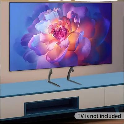 Immagine prodotto di Supporto TV, regolabile in altezza, facile da installare, nero