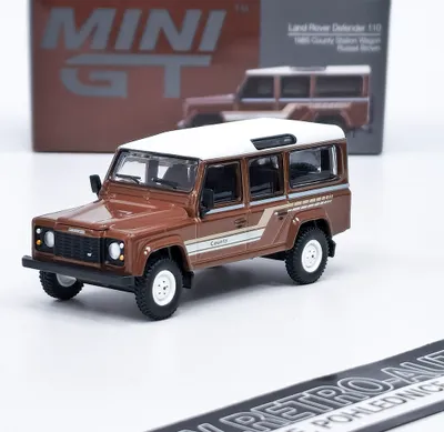 Image de Land Rover Defender 110 1985 County Station Wagon Russet Brown - Mini GT 1:64