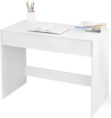 A white desk with a book and pencils on top.