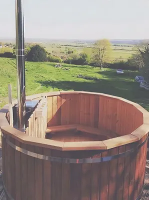 Immagine prodotto di Vasca da bagno esterna in legno termico con idromassaggio, piscina termale, vasca relax
