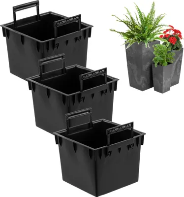 Three black plastic pot inserts are arranged in a staggered formation against a white background. To the right, two grey, textured planters hold plants, one larger with a fern and red flowers, and a smaller one with a green plant.
