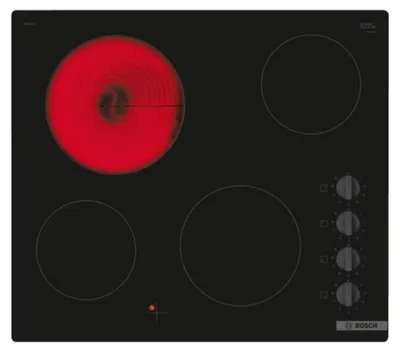 A top-down view of a black ceramic electric hob with one burner glowing red hot.