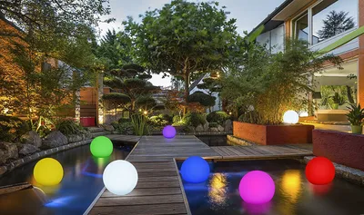Produktbild von Innocom Solar Garten- & Dekoleuchte, Ø 40 cm, Kugelform, schwimmfähig, 8+1 Farben, Warm-/Kaltweiß, LED, Kunststoff, IP67, bis zu 8h Leuchtdauer