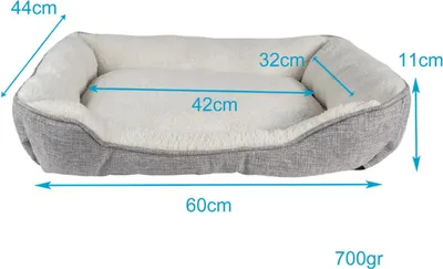 A pet bed with dimensions indicated by measurement lines.