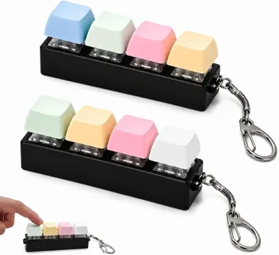 Produktbild von Fidget-Spielzeuge als Schlüsselanhänger – Set mit 2 Stück – Schlüsselanhänger mit Knöpfen in 4 Farben – Tastatur-Design – Spielzeug für Erwachsene