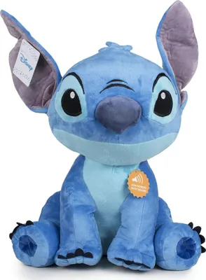 A plush toy of the Disney character Stitch is sitting and facing the camera.