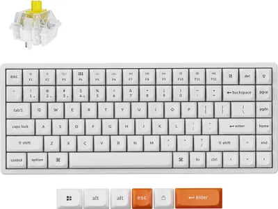 A white mechanical keyboard and a single yellow mechanical switch are displayed against a white background.