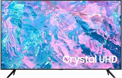 A Samsung Crystal UHD television with a colorful abstract background displayed on its screen.