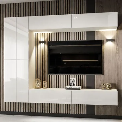 A modern white entertainment center with a large television mounted on a slatted wood panel wall.