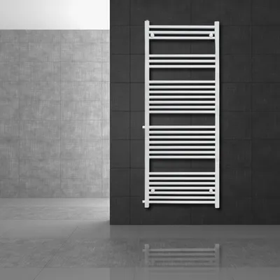A white towel radiator mounted on a dark tiled wall in a modern bathroom setting.
