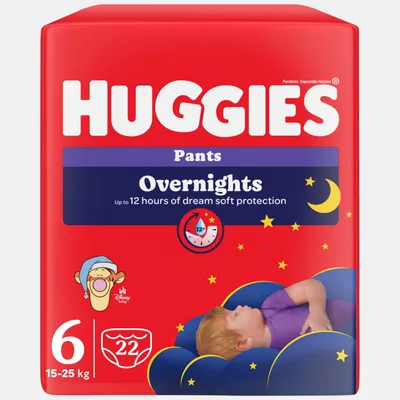 A package of Huggies Overnights diapers featuring a sleeping baby illustration and stars.