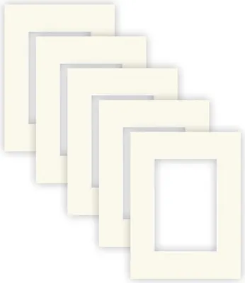A stack of five cream-colored picture mats, each with a rectangular cutout, arranged in a staggered diagonal pattern against a white background.