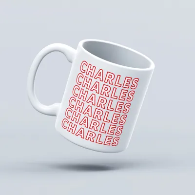 A white mug with the name 'Charles' repeated in red text is shown against a light gray background.