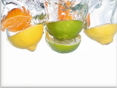 Produktbild von ARTland Glasbild Zitrusfrüchte fallen in klares Wasser Größe: 60x45 cm
