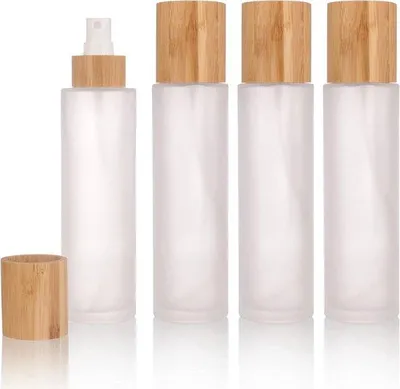 Produktbild von Set aus 4 leere 150 ml Flaschen mit Bambusabdeckung für flüssige Parfüms und Toilettenartikel