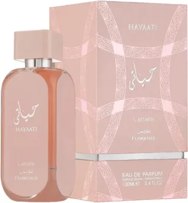 A perfume bottle and its packaging are displayed against a white background.