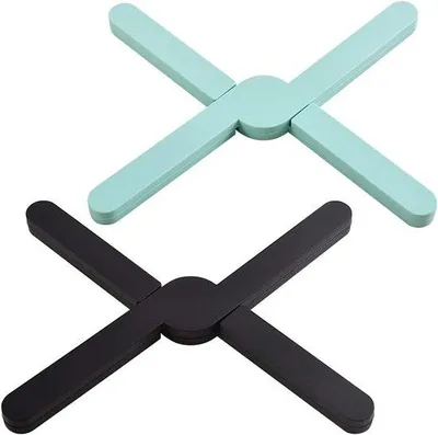 Immagine prodotto di Sottopentola antiscivolo in silicone per piatti caldi (2 pezzi) - Supporto compatto per pentole - Resistente al calore - Pieghevole