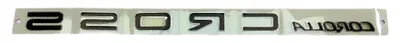 Zdjęcie produktu dla TOYOTA Corolla Cross Chromowany emblemat tyl CROSS 75442-0A070 OE