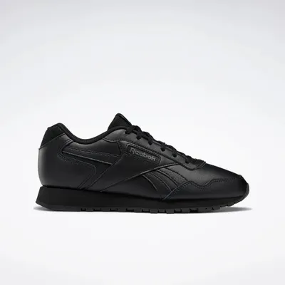 A black Reebok sneaker is shown from the side against a white background.