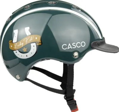 A green equestrian helmet with white stripes and a gold horseshoe graphic with the text "Lucky Kid!". The brand name "CASCO" is also visible.