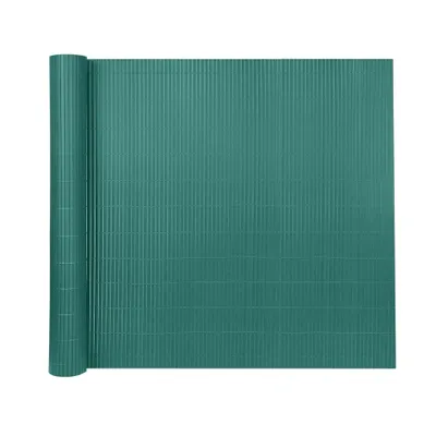 A rolled-up green privacy screen mat on a white background.