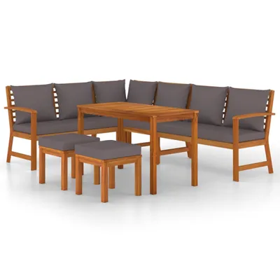 A wooden garden dining set with grey cushions, including a corner sofa and a table, with two ottomans in the foreground.