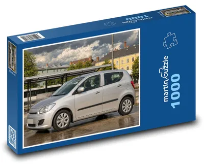Produktbild von Puzzle 1000 Stadtauto am Bahnhof - martinpuzzle
