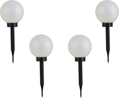 Four solar-powered garden lights with white spherical tops and black stakes.