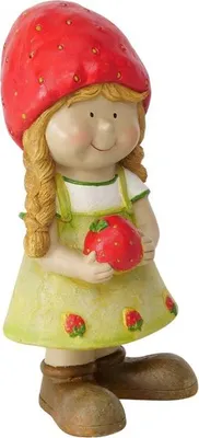 A figurine of a girl dressed as a strawberry, holding a strawberry.