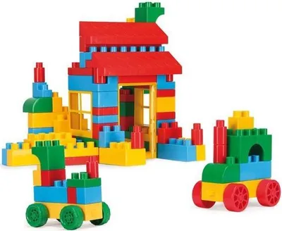 A set of colorful building blocks arranged to form a house and two vehicles.