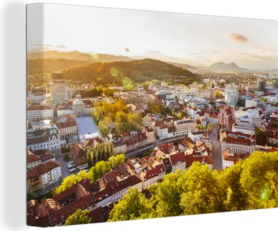 Produktbild von OneMillionCanvasses® - Leinwandbilder - 140x90 cm, Ljubljana in Slowenien bei Sonnenuntergang, Wandbilder Kunstdruck Wanddekoration