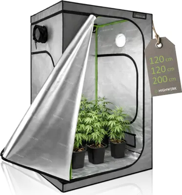 A grow tent with plants inside, with a tag showing dimensions.